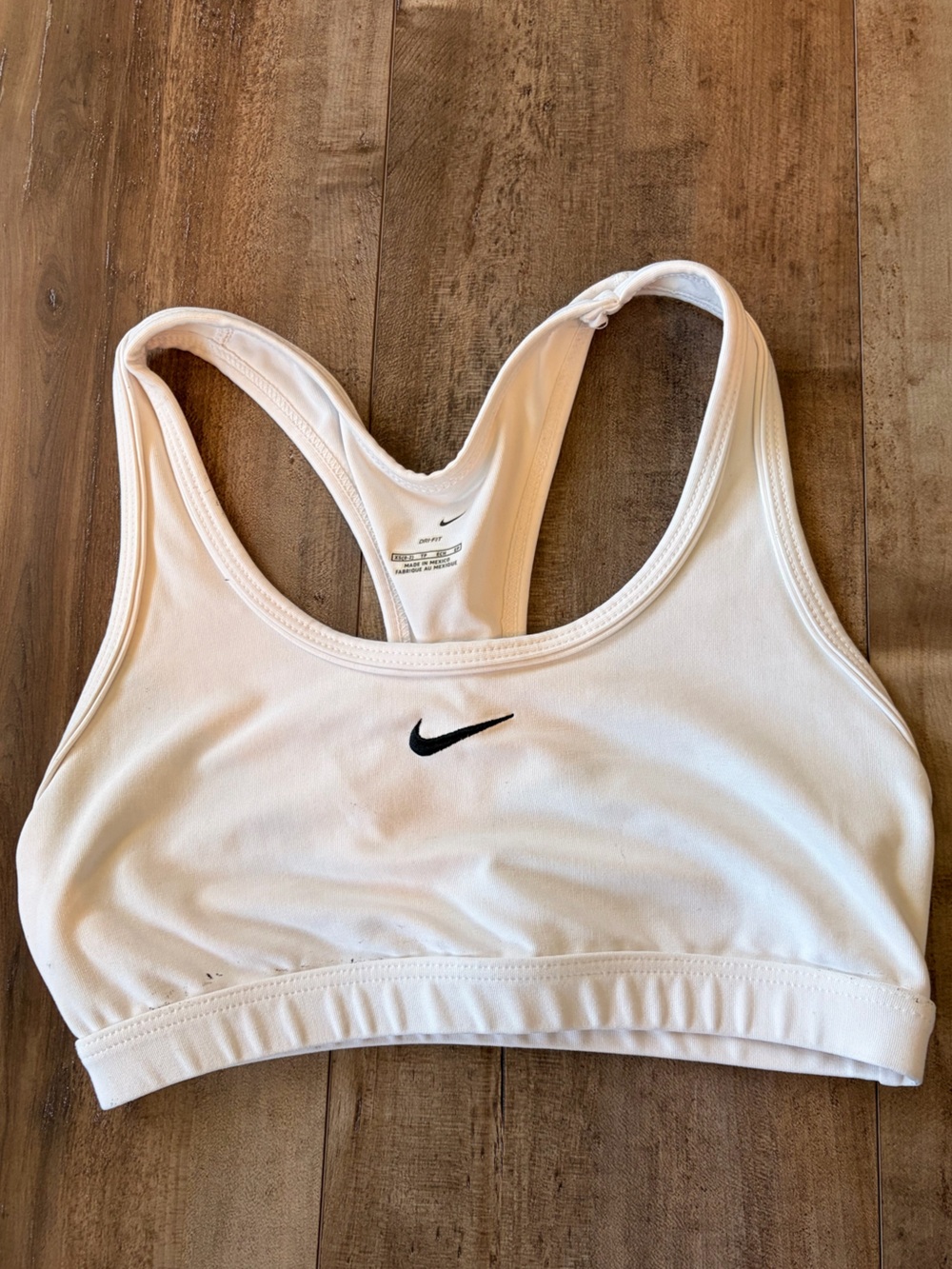 White Nike swoosh, support sports bra. Size XS